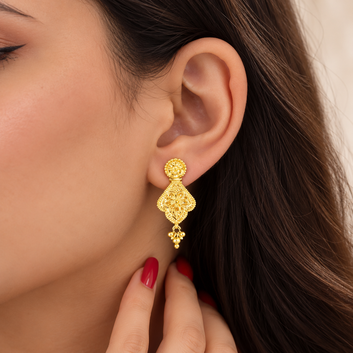 Gold filigree drop earrings with flower stud and bead tassel