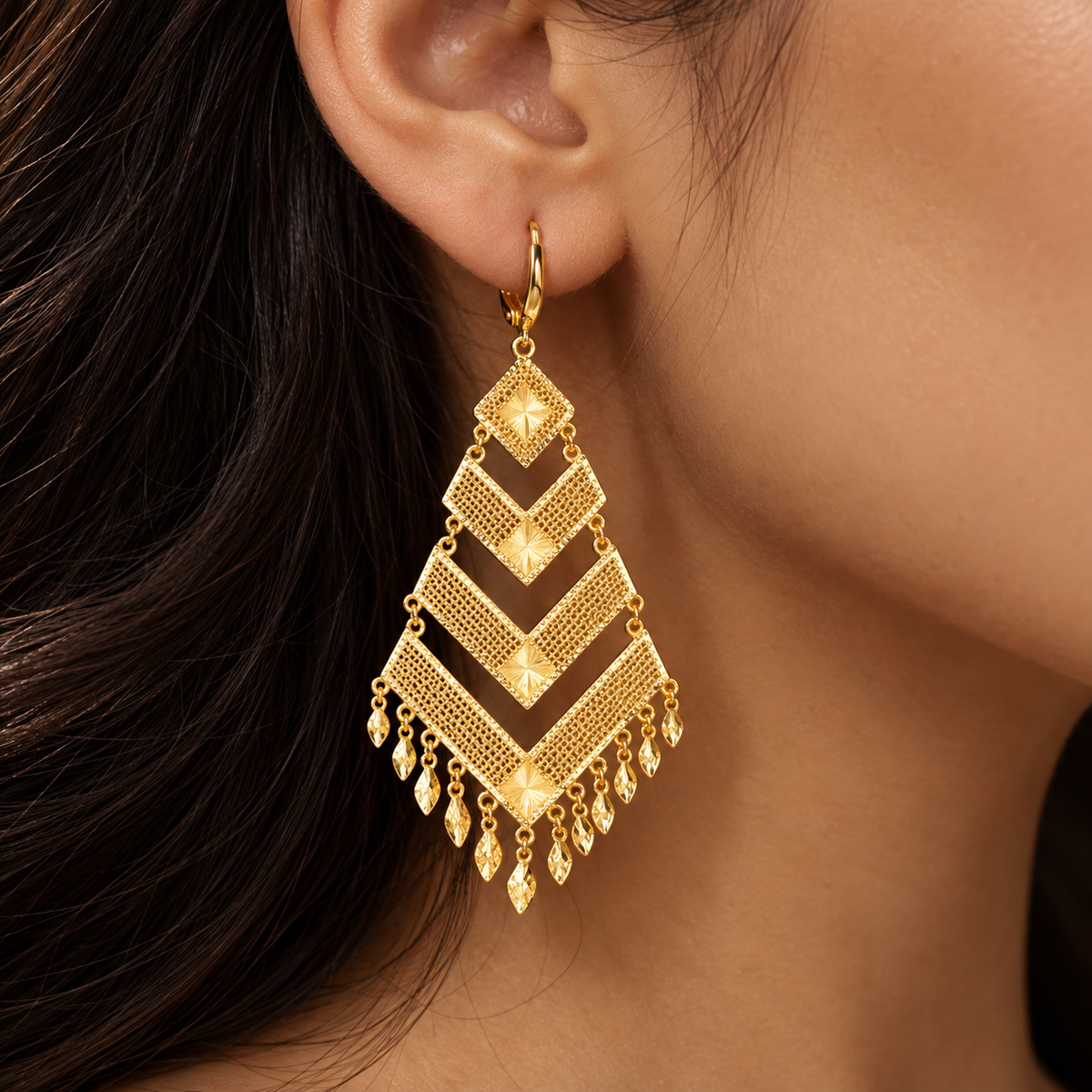Four-tier gold mesh chevron earrings with diamond-cut sunbursts
