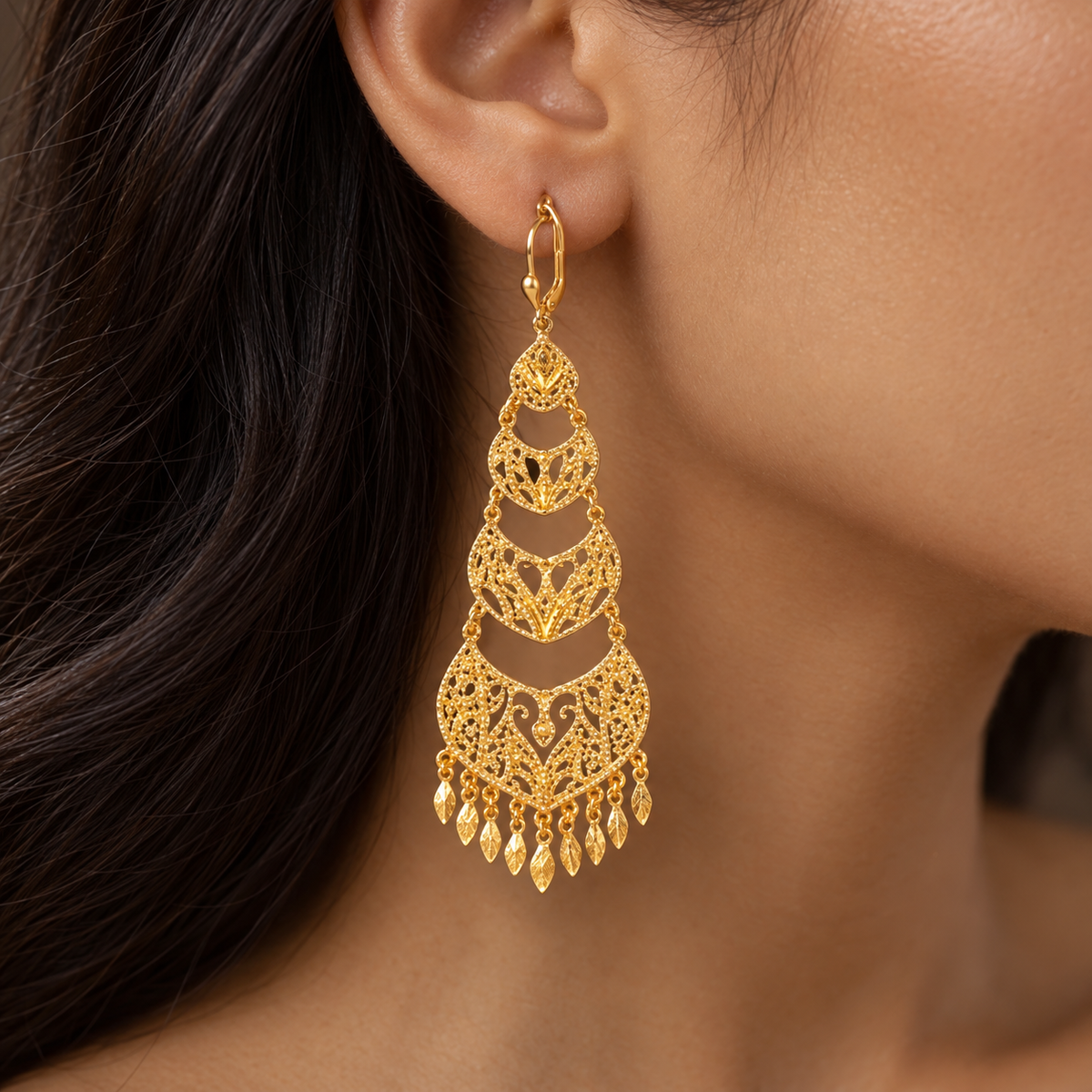 Long four-tier gold filigree crescent earrings with leaf fringe