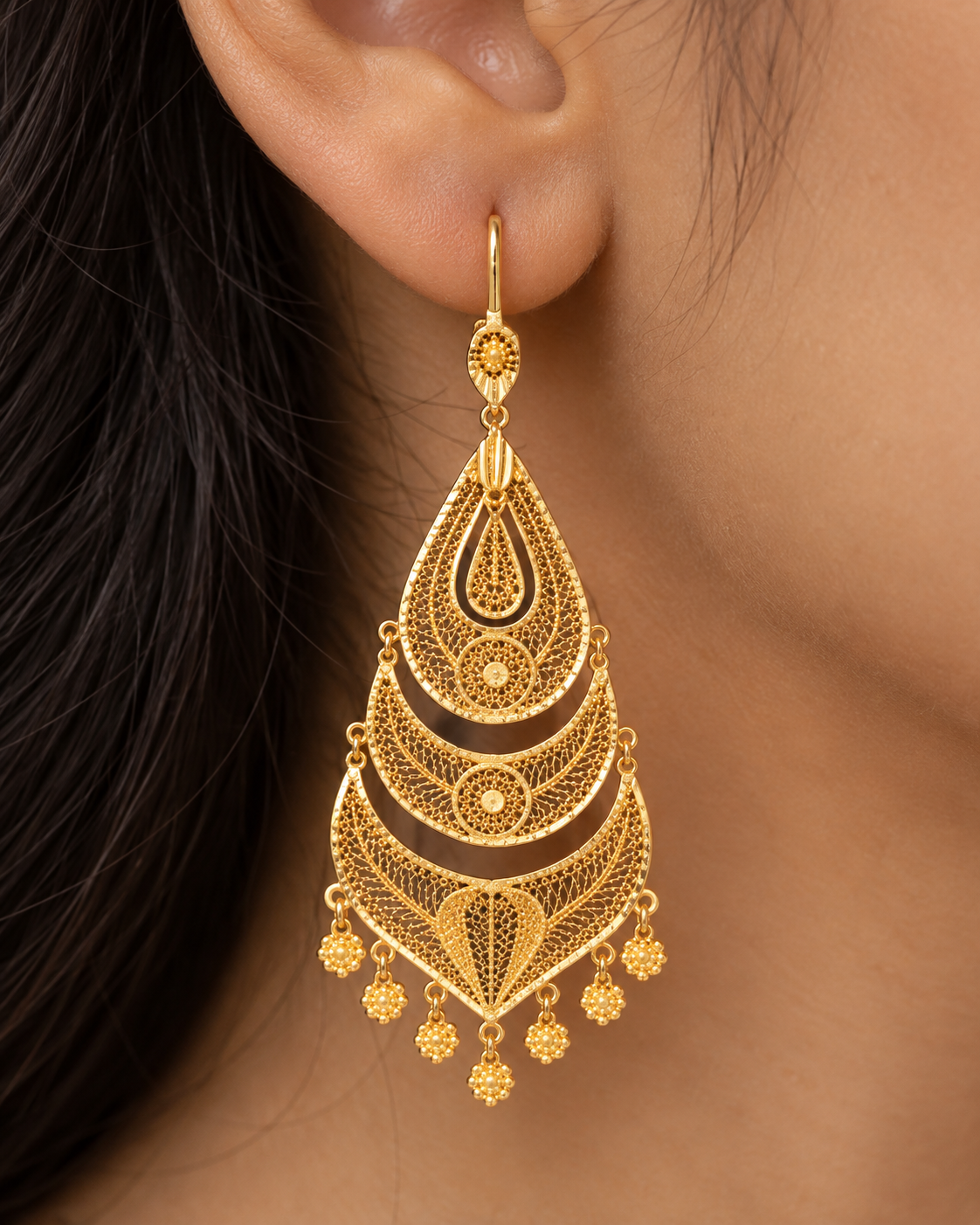 Tiered gold filigree teardrop chandelier earrings with flower bead fringe